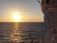 Sun setting at sea